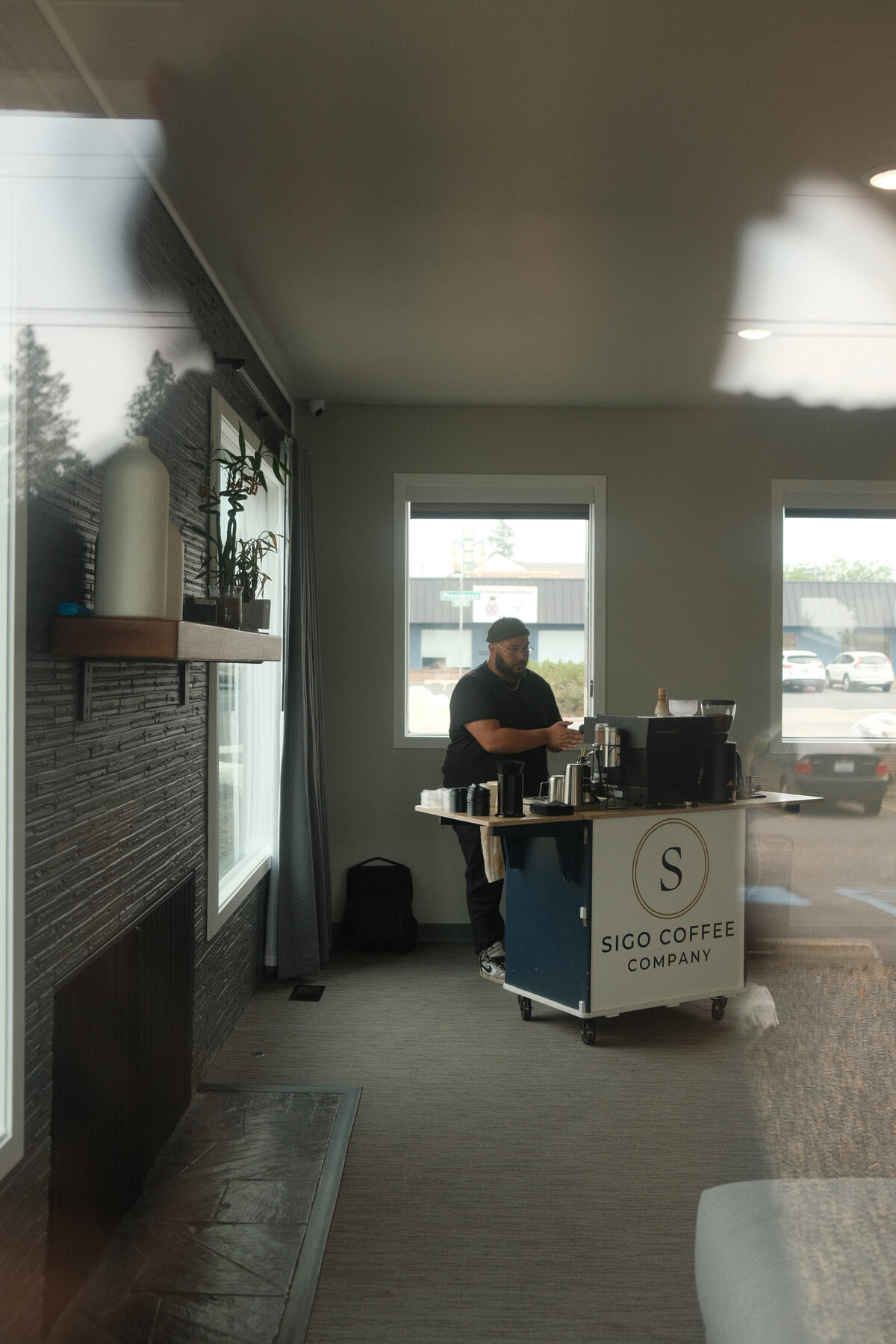 The Sigo cart set up near a window with city rooftops visible outside